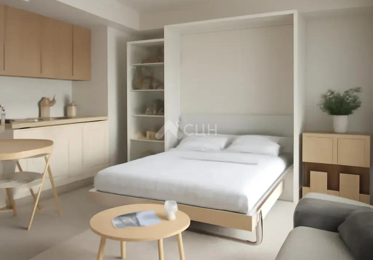 На фото квартира студия 25м2 с мебелью-трансформером